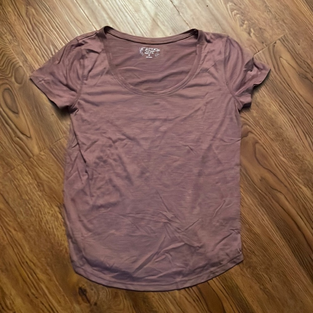 Worn a few times medium purple mudd brand shirt very light and easy on the skin.